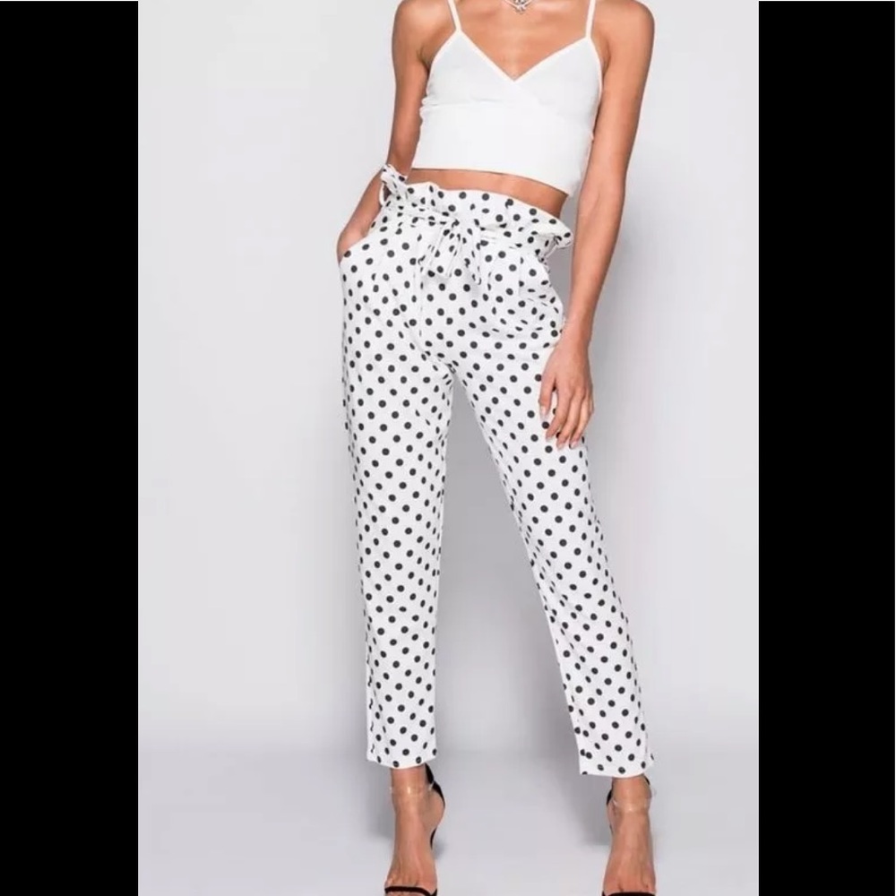 White polka dot trousers